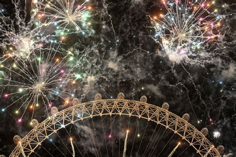 Fireworks Light Up The Sky Over The London Eye In Central London During
