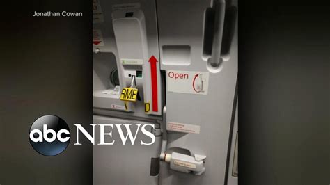 passenger tries to open plane door mid flight witnesses wnt youtube
