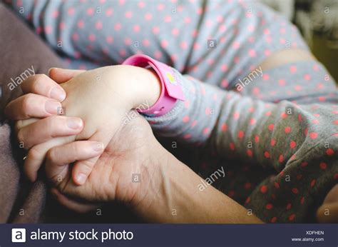 Adult Daughter Holding Hands Her Mother High Resolution Stock