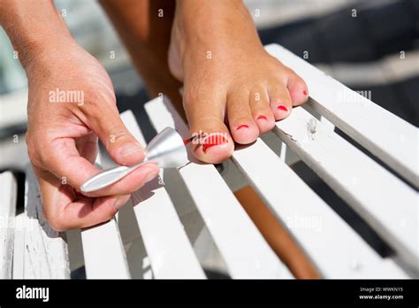 Woman Painting Toe Nails Close Up Hi Res Stock Photography And Images