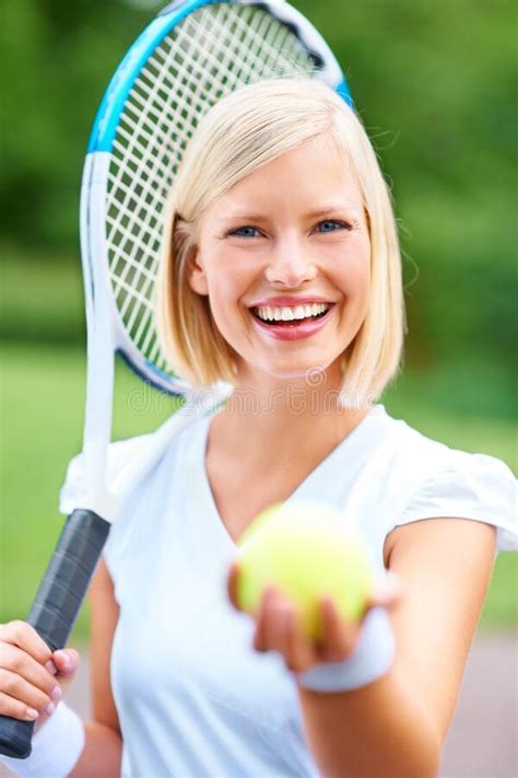 Are You Up For A Game Portrait Of A Young Female Tennis Player Holding
