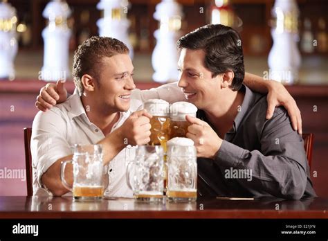 Two Drunken Gay Men With A Beer In A Pub Stock Photo Alamy