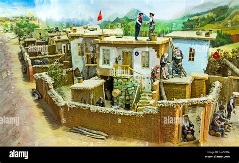 The Diorama Of The Rural Life With The Miniature Figures Of People And