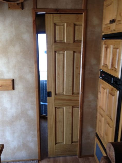 Photo courtesy of johnson hardware. pocket door to bathroom | Tall cabinet storage, Bathroom ...