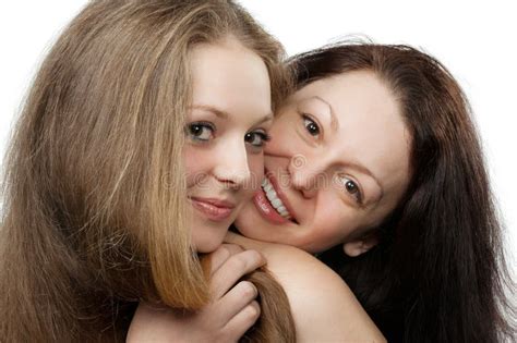 Two Lesbians Sisters Twins Beautiful Curly Blonde Young Woman In Stylish Dress Holding Hands In