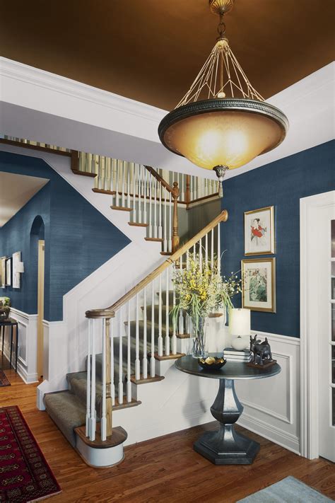 Foyer Featuring Bold Blue Walls And Copper Colored Ceiling Lookat The