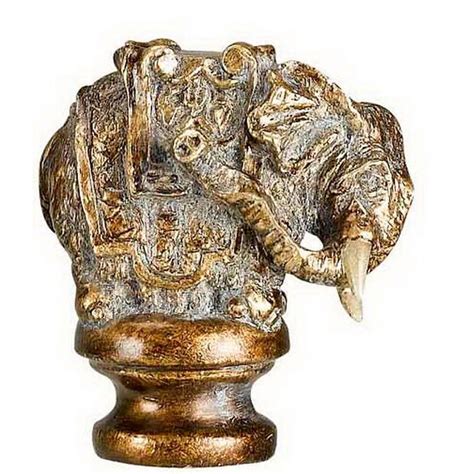 Very few people will actually know this but the piece on top of a lamp that screws on to hold the lampshade in place is called a finial. CAL Lighting 2.25 in. Brown Elephan Resin Lamp Finial-FA ...