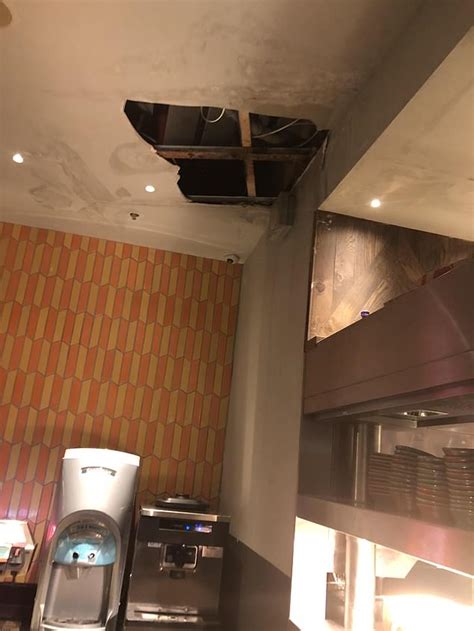 Customer Films Water Leaking From Ceiling In Nandos Inches From The