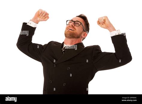 Excited Businessman In Formal Suit Holding Fists And Smiling Happy