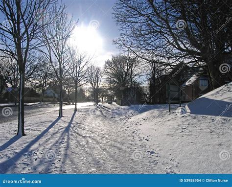 Light Snowfall In The Neighborhood On A Winters Day Stock Photo Image