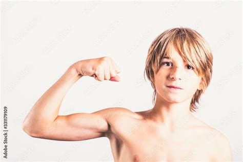 Young Boy Showing His Biceps Strength Healthy Body Concept Fitness