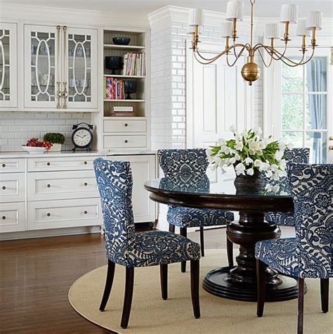 In this article, we focus on how to choose the best upholstery fabrics for your dining room chairs, and the aesthetic characteristics of each one. Via Traditional Home. Beautiful fabric on dining chairs ...
