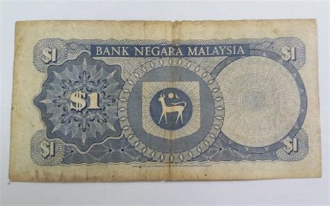 On the back, malaysia presents its economic and technological pride: RM 1 Ringgit Malaysia Bank Note (end 3/11/2018 4:15 PM)