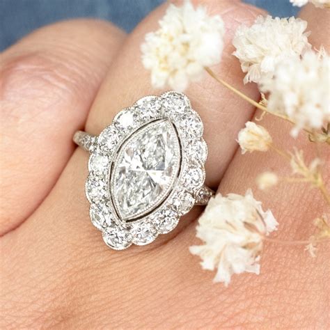 Marquise engagement rings and your guide to marquise diamonds. Marquise Cut Diamond Halo Platinum Engagement Ring