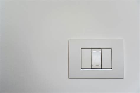 White Light Switch On White Painted Wall · Free Stock Photo
