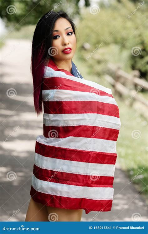 beautiful asian girl posing in the american independence day stock image image of lovely