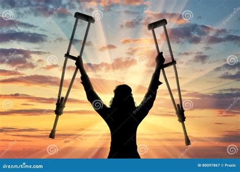 Happy Disabled Person With Raised Hands Crutches Stock Image Image Of