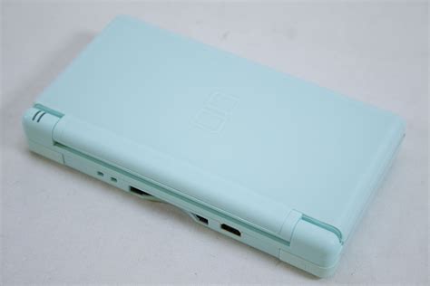 Nintendo Ds Lite Ice Blue Handheld System With Charger And Case Bundle