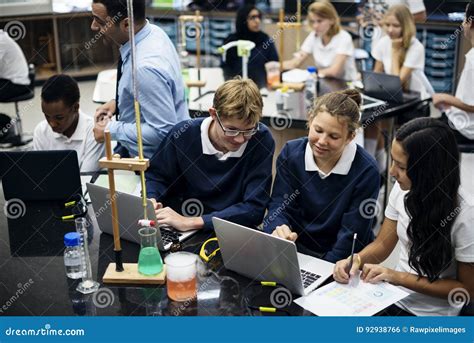 Group Of Students Laboratory Lab In Science Classroom Stock Photo