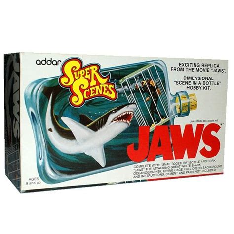A Box With An Image Of A Shark In Its Mouth And The Words Jaws