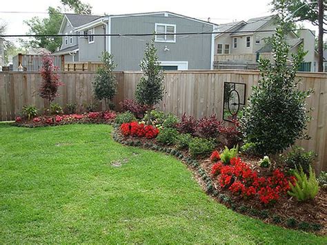 18 Backyard Landscaping Ideas Along Fence 2023