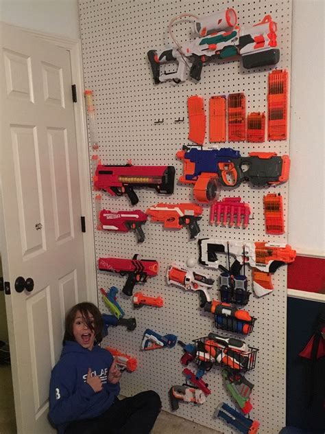 Nerf gun rack storage for up to 7 weapons all wood construction holds many different models wall mount hardware included made in the usa!!! Pin on My Own Crafty DIY and Pinterest Hacks