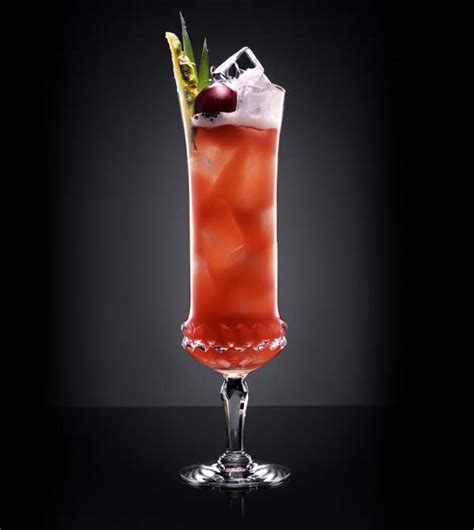 First crafted at the long bar in the raffles hotel in singapore in the early 1900s, the singapore sling is known for its bright pink hue and foamy fruit punch cap. The Singapore Sling - Article - FineCooking