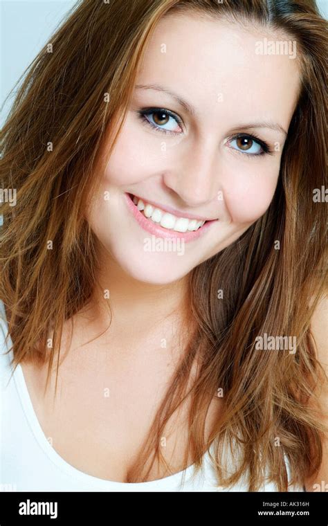 Portrait Of A Young Woman Smiling Stock Photo Alamy