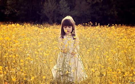 Cute Little Girl In The Flower Field Mystery Wallpaper