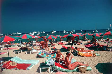 Beach At St Tropez Photograph By Slim Aarons Pixels