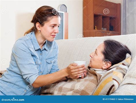 Adult Daughter Caring For Sick Mature Mother Stock Image Image Of Influenza Care 41119463