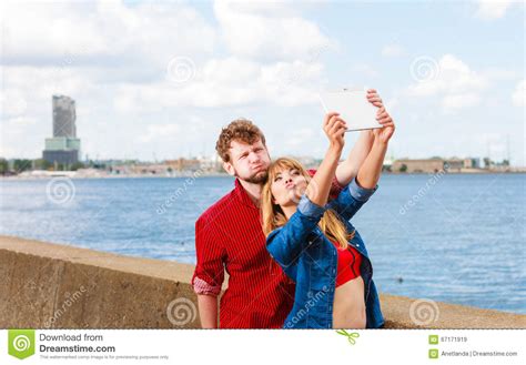 Young Couple Taking Self Picture Selfie With Tablet Stock Image Image Of Outdoors Tablet