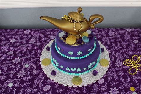 Aladdin Cake With Genie Lamp Jewels And Chocolate Coins Aladdin Cake Jasmine Cake Chocolate Coins