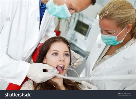 Young Woman Getting Dental Treatment Stock Photo Edit Now 490211863