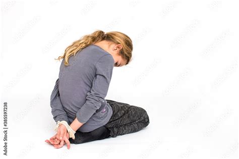 Child Hands Tied With A Rope Young Girl Kneeling With Tied Hands Stop