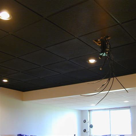 For more ylighting ideas, see our ceiling lighting ideas. Black Drop Ceiling Tiles 22 #BasementCeilingDesignideas ...