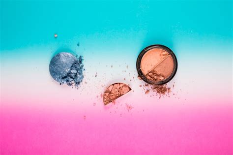 Free Photo Elevated View Of Makeup Kit With Brushes On Pink Background