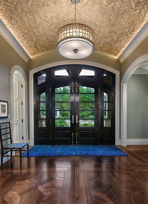 A Herringbone Patterned Brick On The Foyer Ceiling Is A