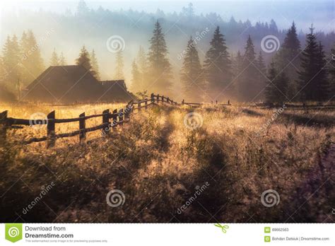 Morning Sun Rays In The Fog Mountains House Stock Image Image Of