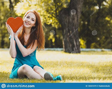 Redhead Girl With Heart Shape In The Park Stock Image Image Of