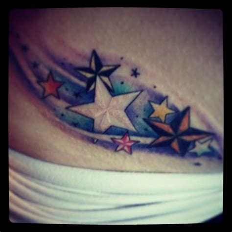 Star tattoos/shooting star tattoos are a great choice for all astronomy lovers or just people who enjoy hanging outside in the nighttime air. Nautical shooting stars | Star tattoos, Triangle tattoo ...