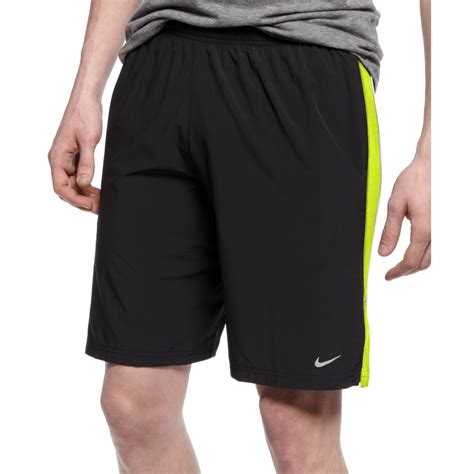 Nike 9 Inch Stretch Drifit Running Shorts In Green For Men