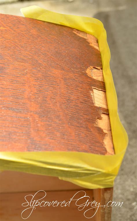 I took a closer look at the veneer when i got the desk home and quickly realized the only real choice i had was to remove the worst of the veneer and paint the top. Fix Chipped Veneer The Easy Way - Slipcovered Grey