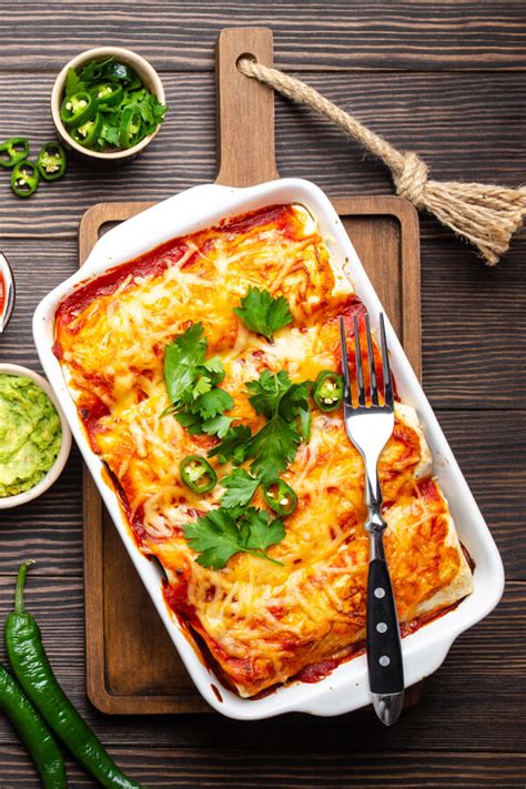 Bring to a simmer and cook until the moisture absorbs into the meat, about 5 minutes. Super Simple Beef Enchiladas Recipe | CDKitchen.com