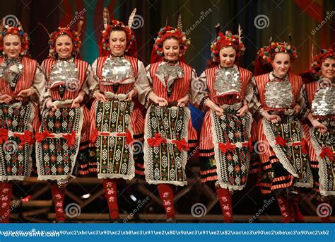 People In Traditional Folklore Costumes Perform Folk Dance Bulgarian