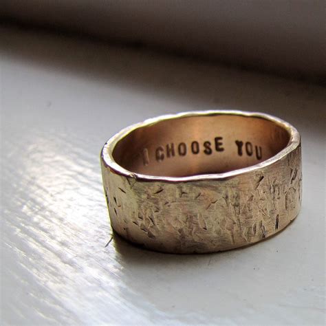 The most popular thing to get engraved on your wedding bands is your partner's initials, his/her name or both of your names and/or your wedding date. Men's 14k Gold Unique Rustic Distressed Wedding Band ...