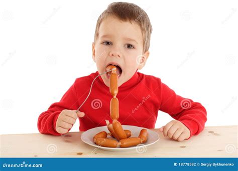 Little Boy Eating The Sausages Stock Photo Image Of Studio Food