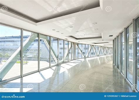 Panoramic View On Empty Office Hall With Glass Wall Windows Made Of