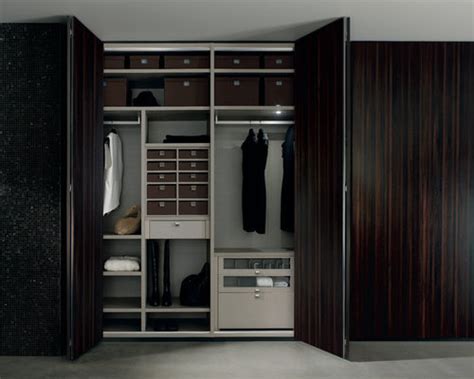 It is usually tall with upright case fitted with hooks and shelves. Wardrobe Interior Design Ideas, Pictures, Remodel and Decor