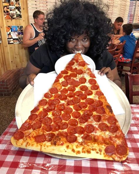 ≡ New Foodie Trend Is A Giant Pizza Slice The Biggest Youve Seen
